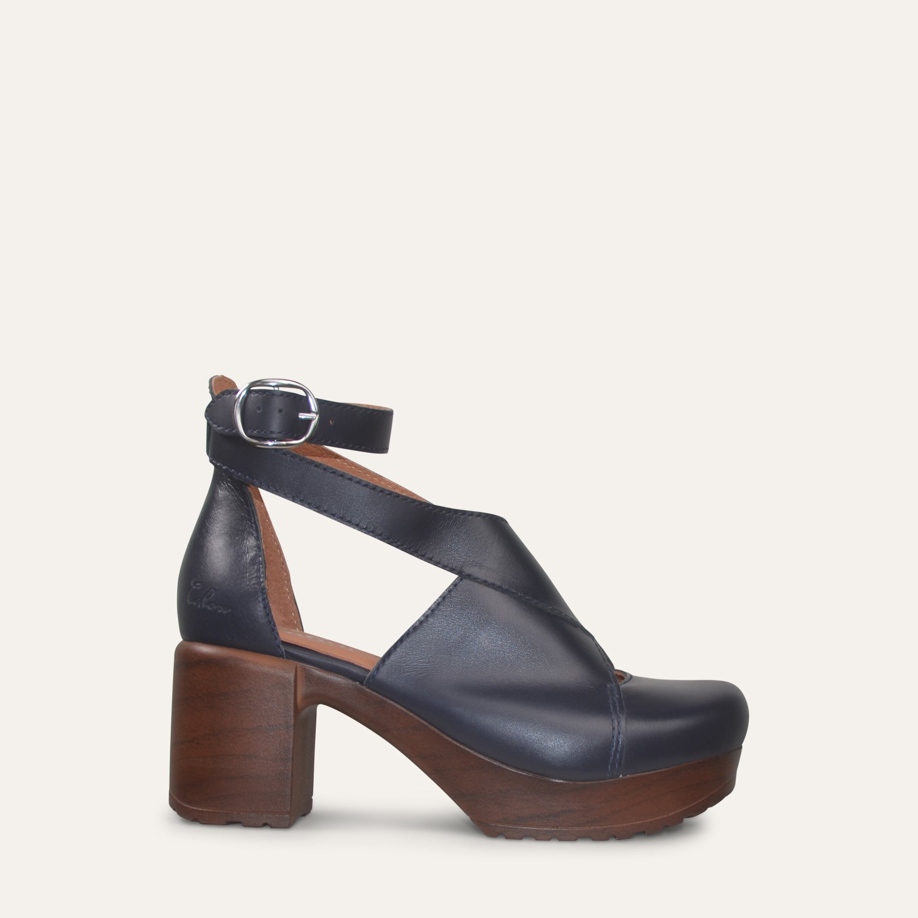 Bea dk blue clog with cross over straps on soft flexible sole