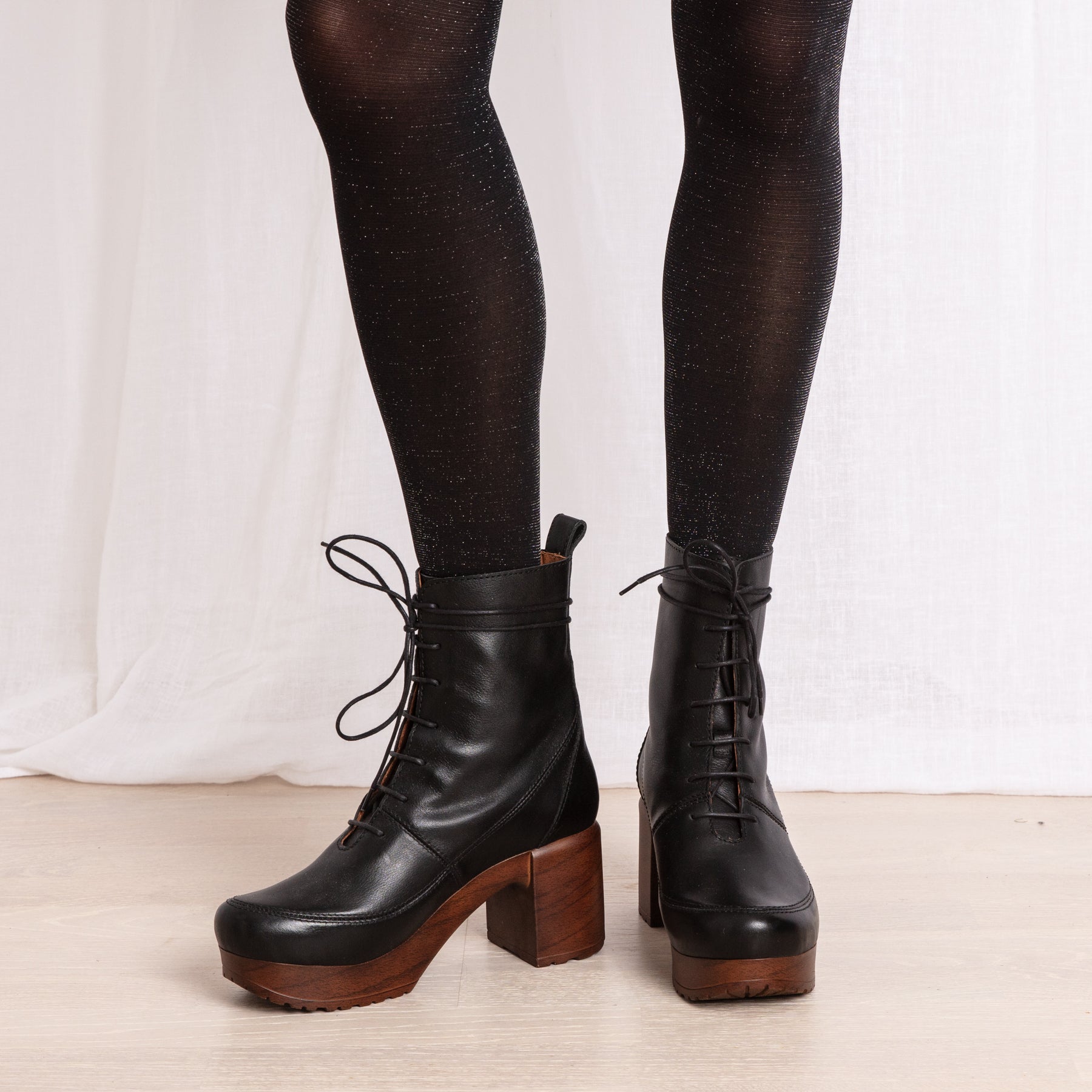 Greta black leather lace-up clog boot on model Calou