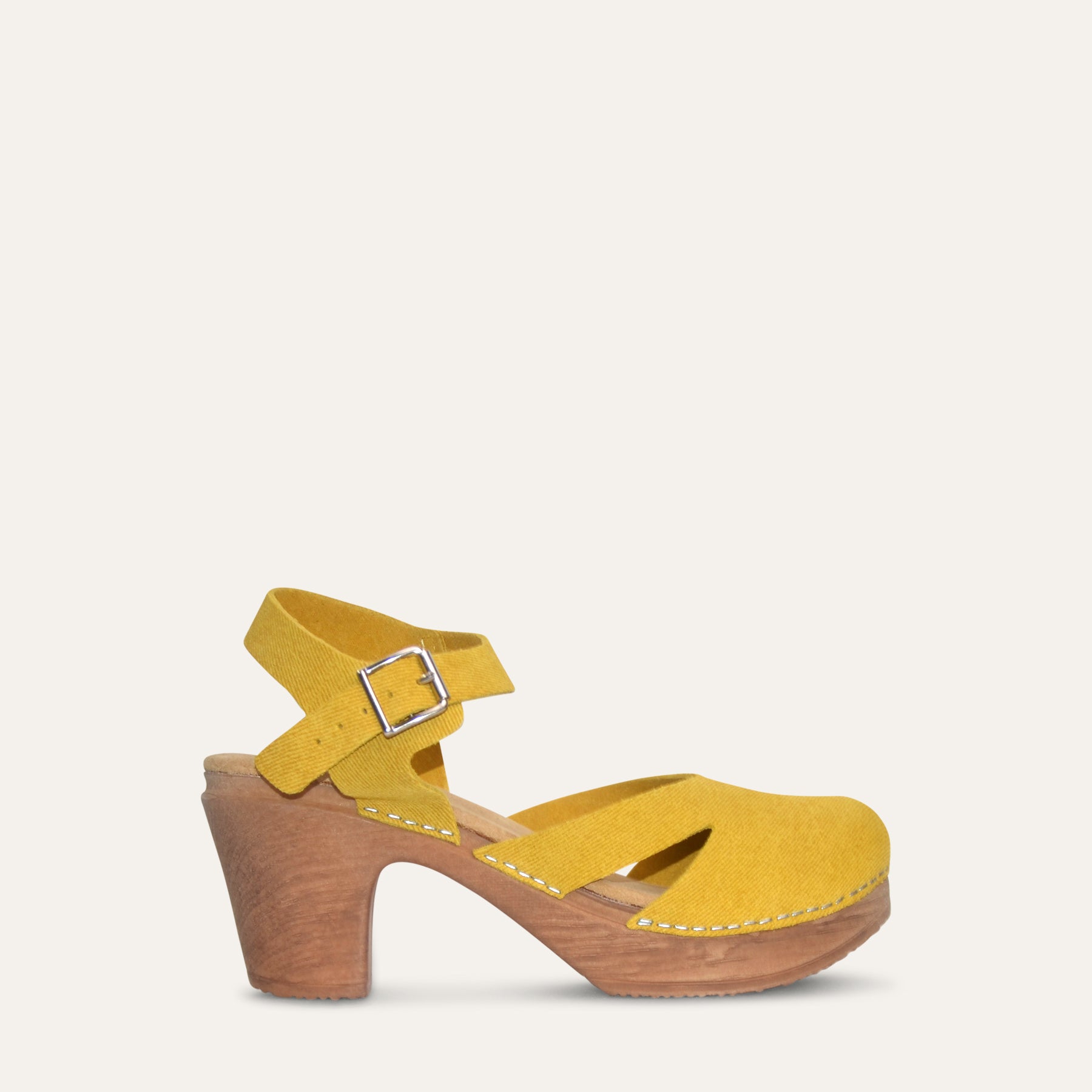 Sideview yellow suede Mary Jane clog with flexible sole by Calou