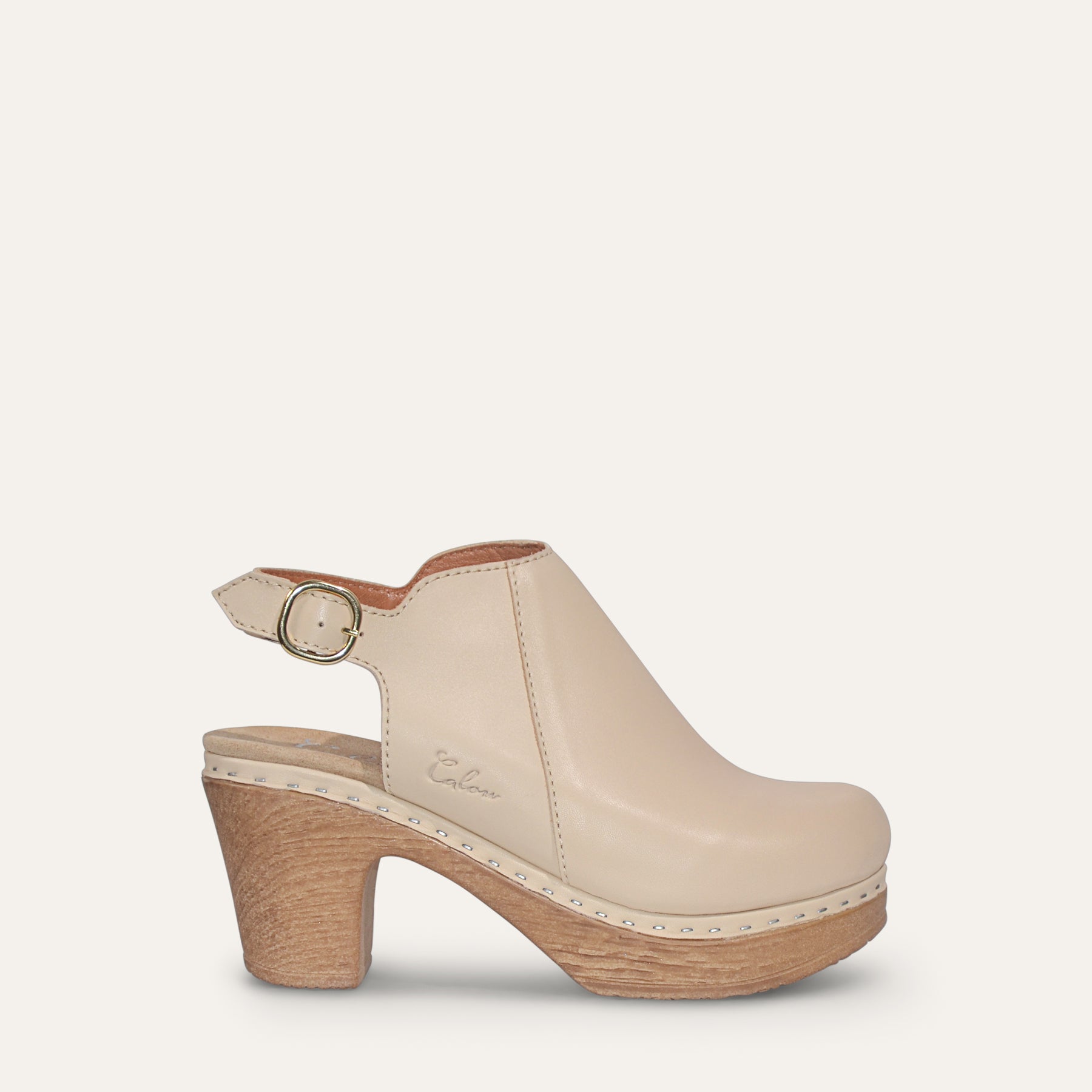 sideview beige leather slingback clog with flexible sole by Calou