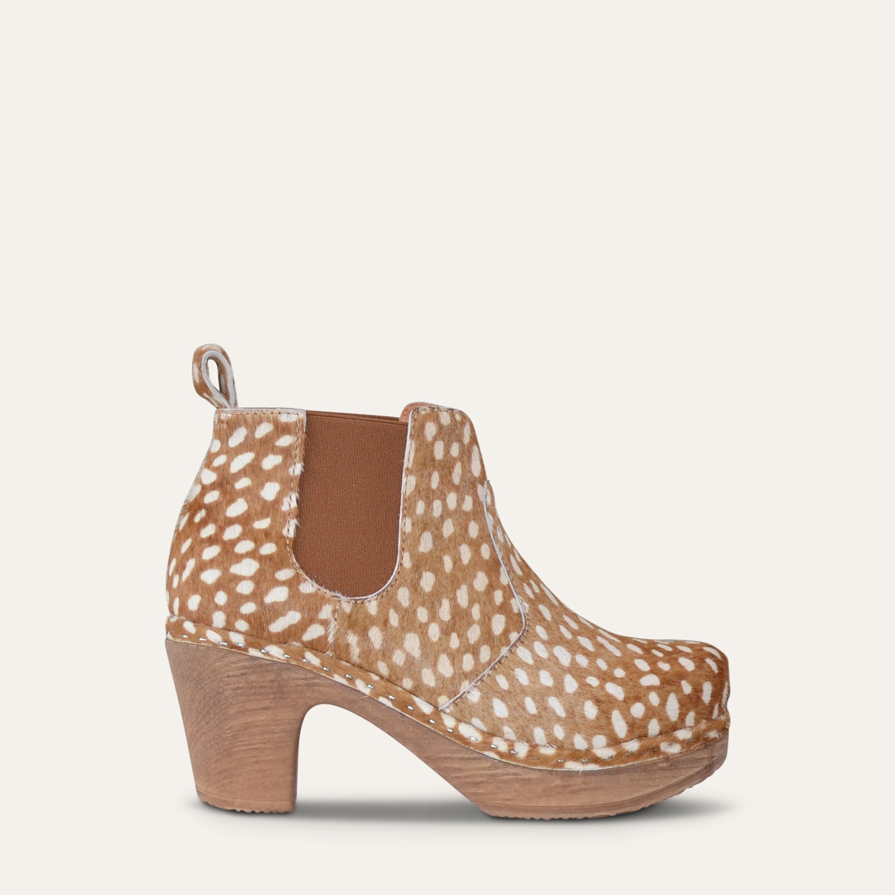 Calou Doris Fur Dot brown clog boot with a soft, flexible, cushioned sole.