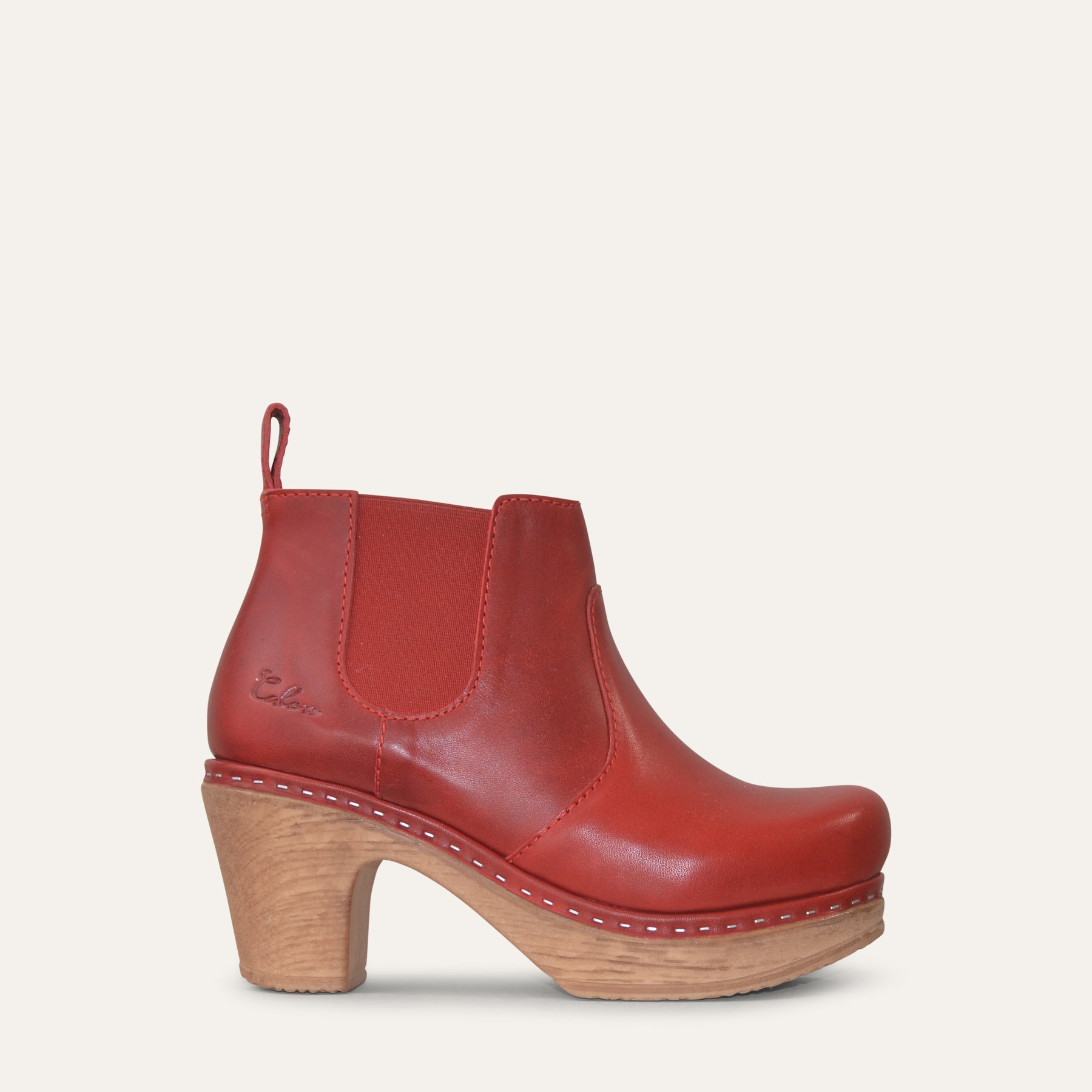 Red leather Calou Doris Chelsea clog boot with elastic side panels and 7.5 cm wooden-look heel, side view