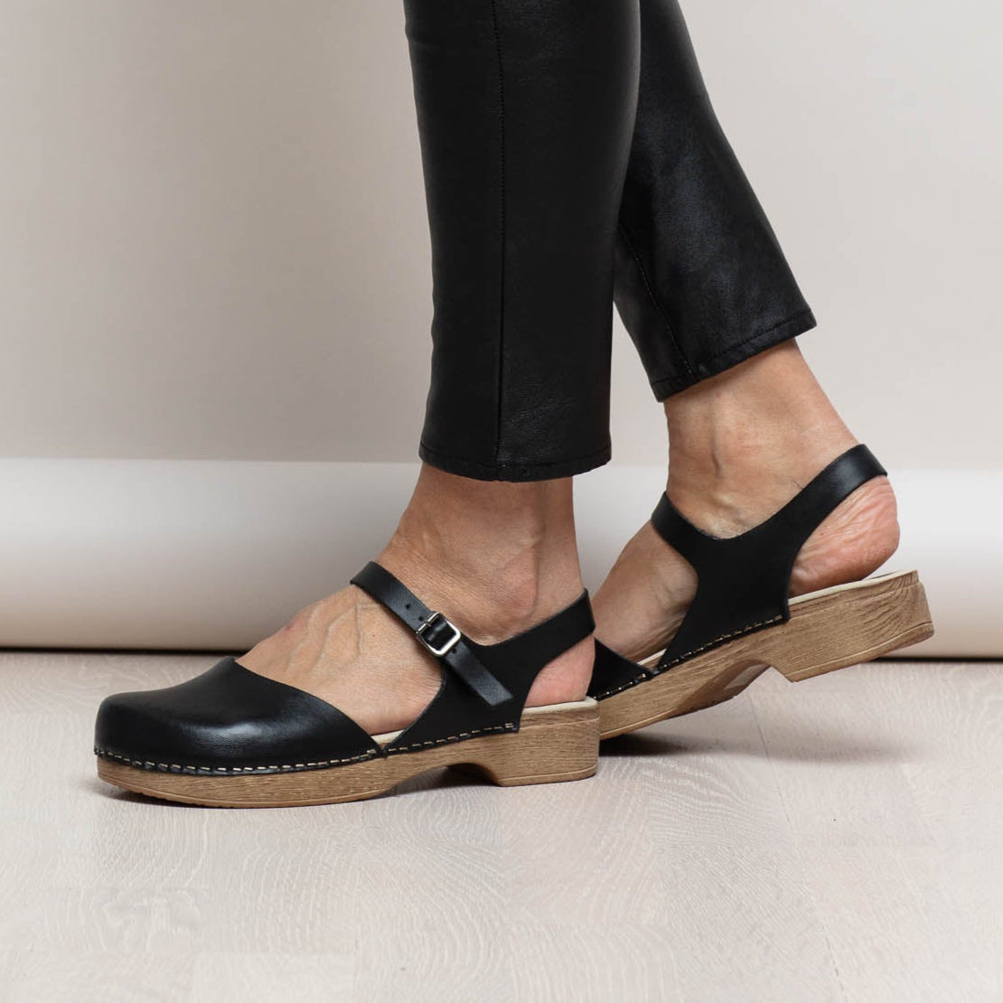 Diana black leather mary jane clog on model Calou Stockholm