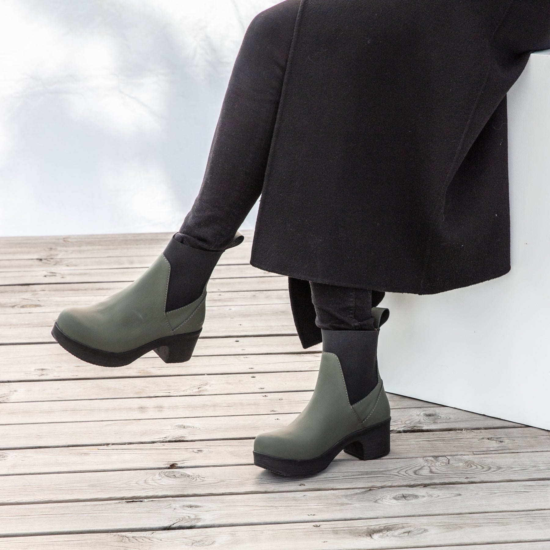 Angelina green waterproof leather boots on model Calou Stockholm