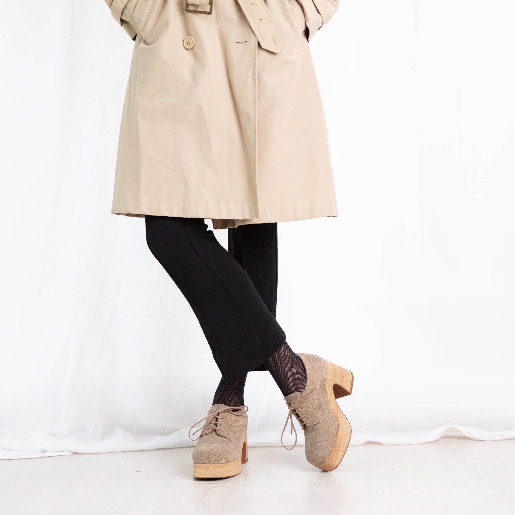 Britta beige suede platform clogs on model