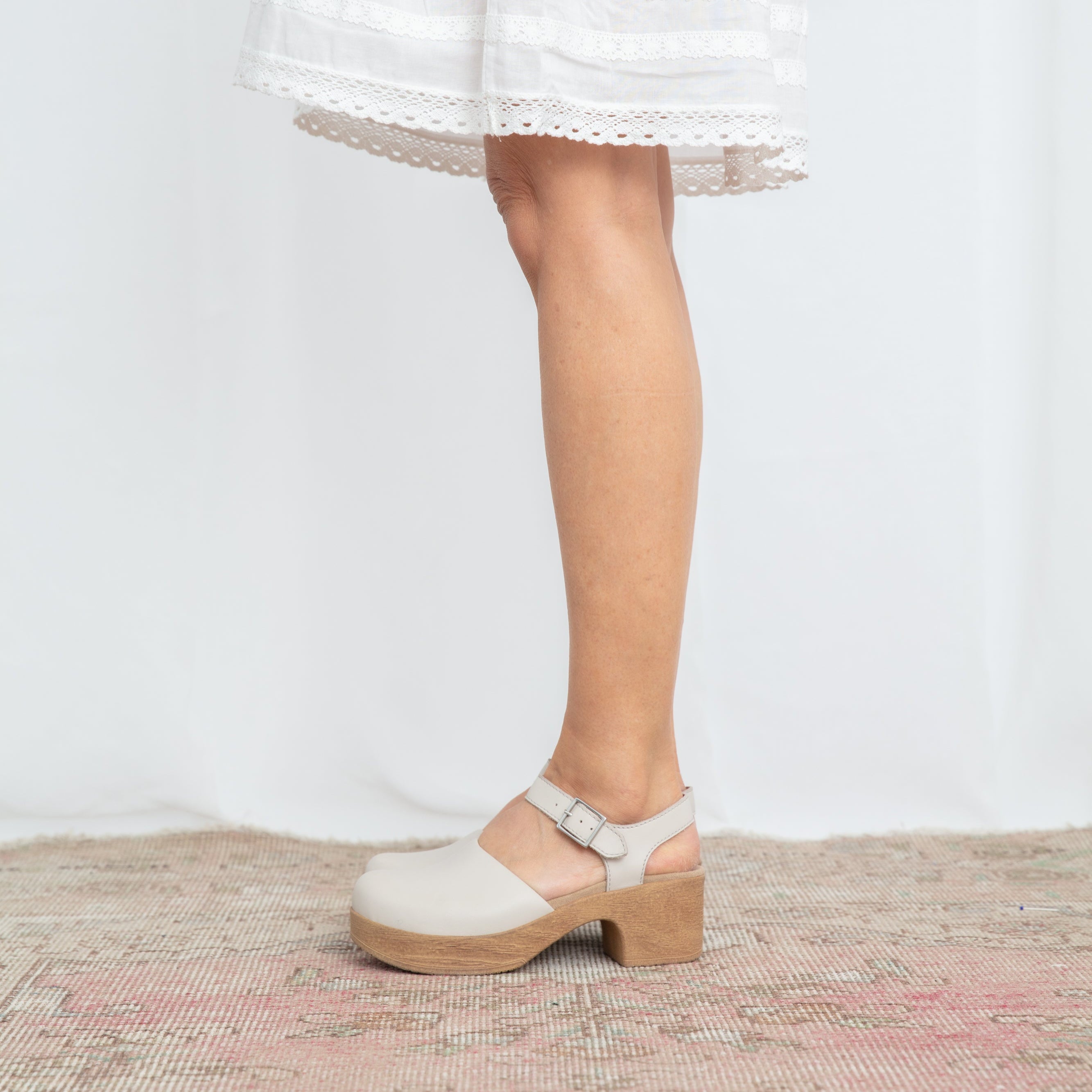 Dolores cream leather clog on model Calou Stockholm