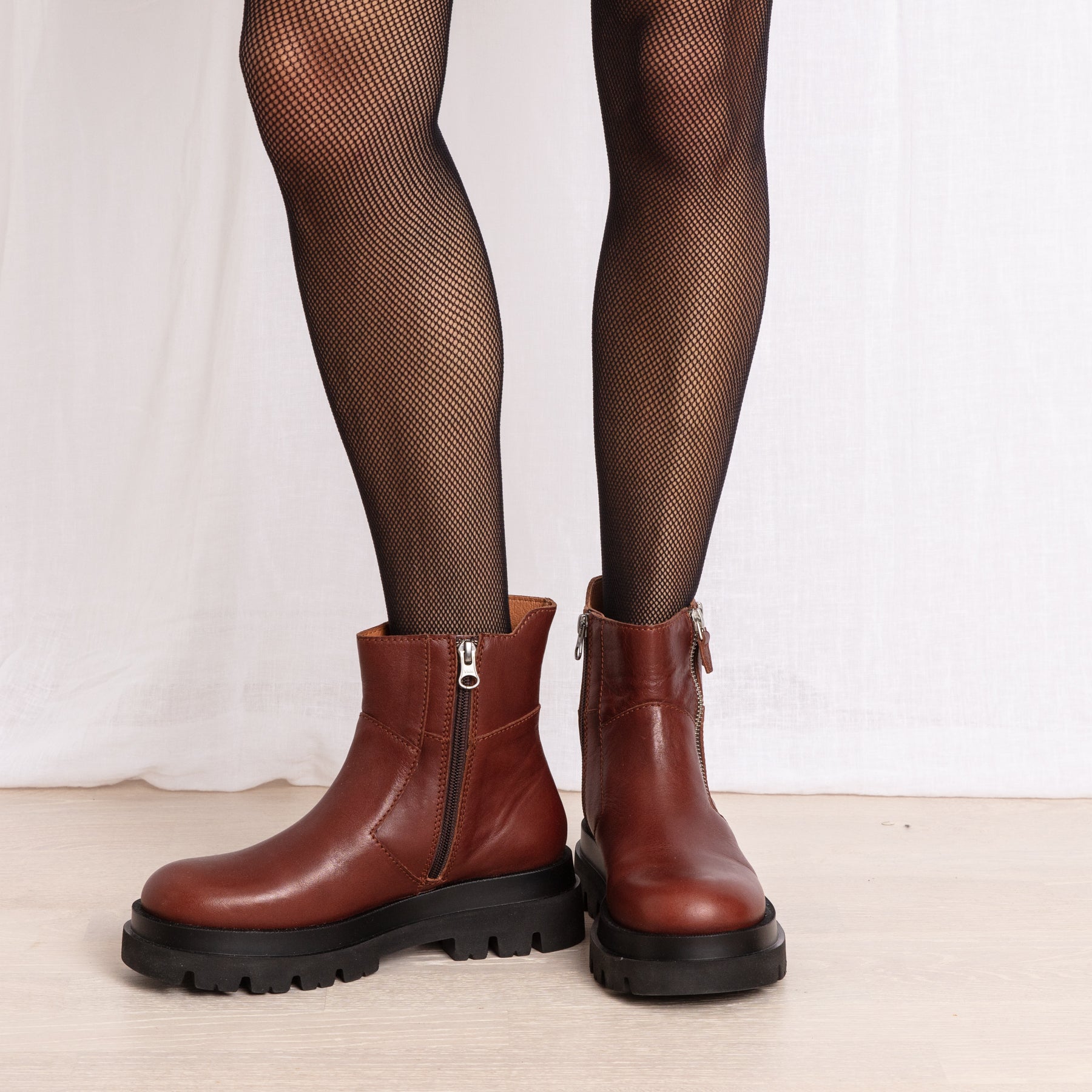 Emma cognac leather boots on model Calou