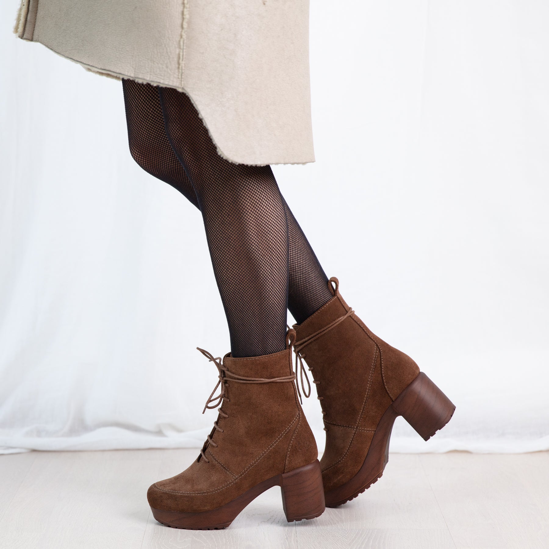 Greta brown suede lace-up clog boot on model Calou
