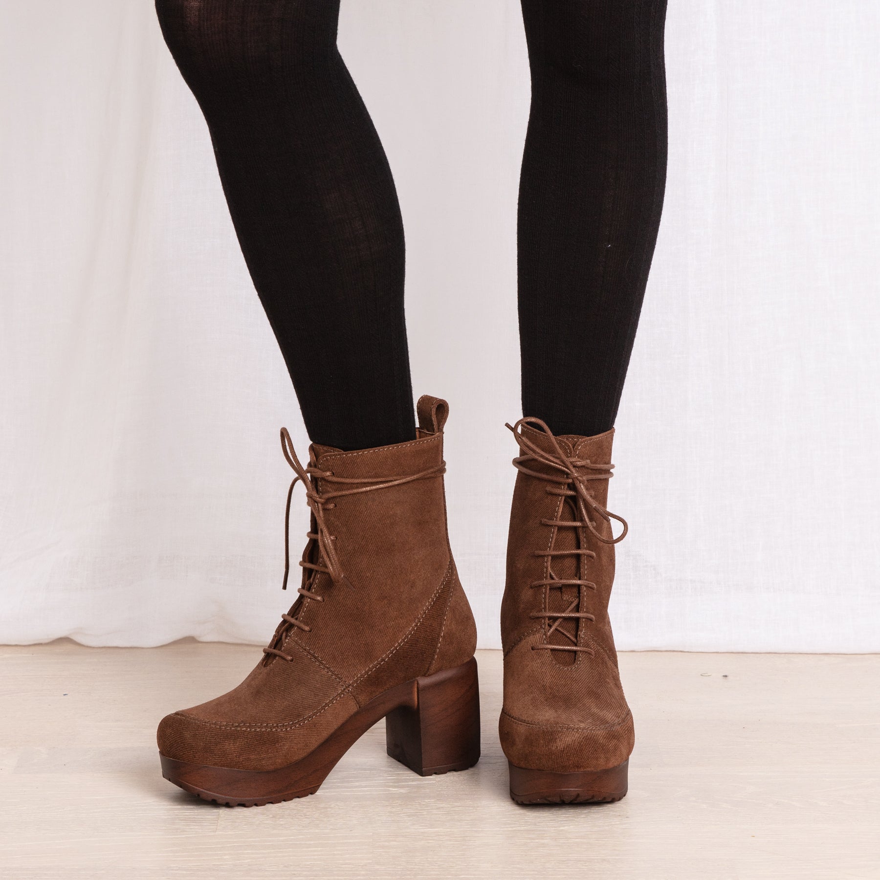 Greta brown suede lace up clog boots on model Calou