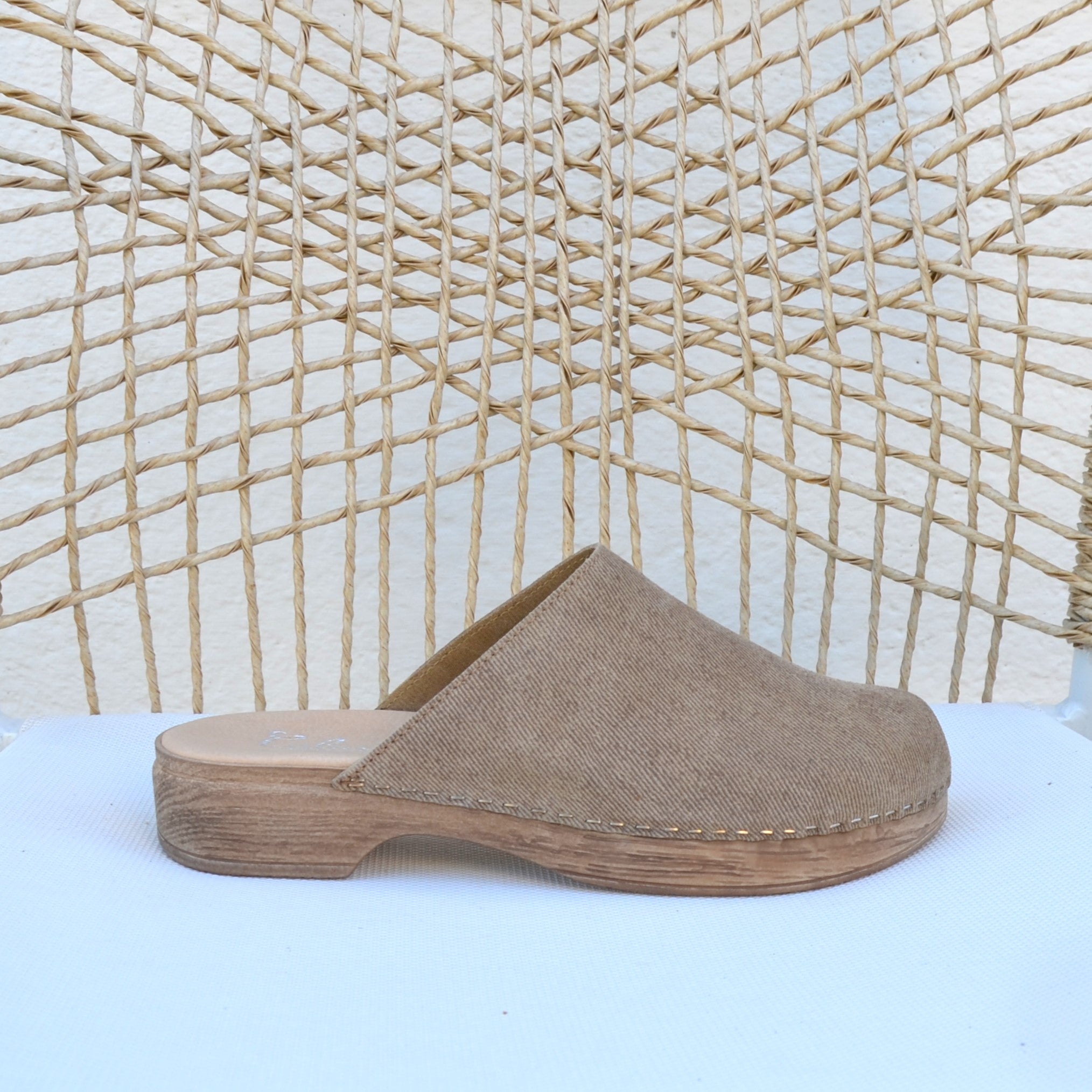 Helena beige suede clog on chair calou stockholm