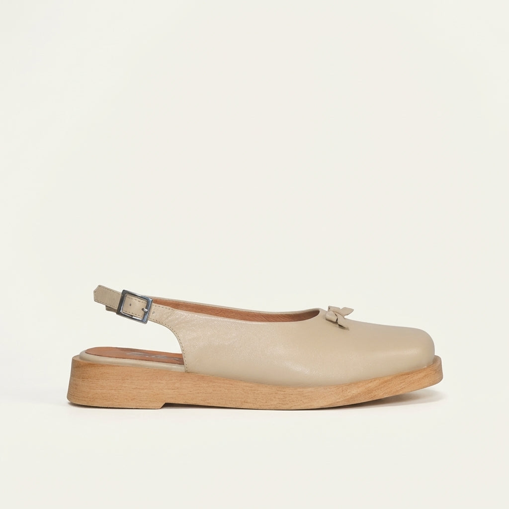 Calou Lollo beige slingback clog sandal with bow decoration. made flat flexible sole