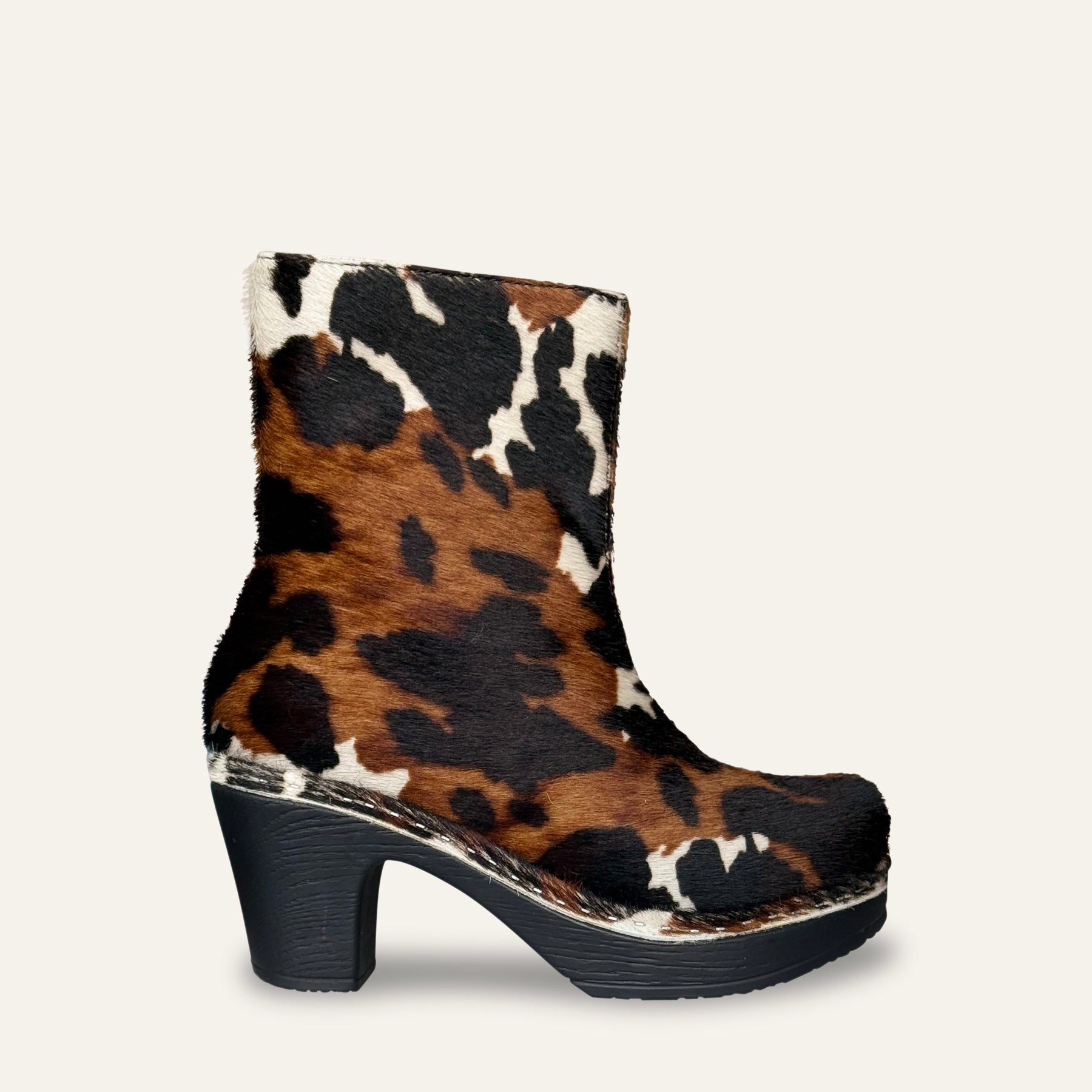 Leopard print boot on a light gray background