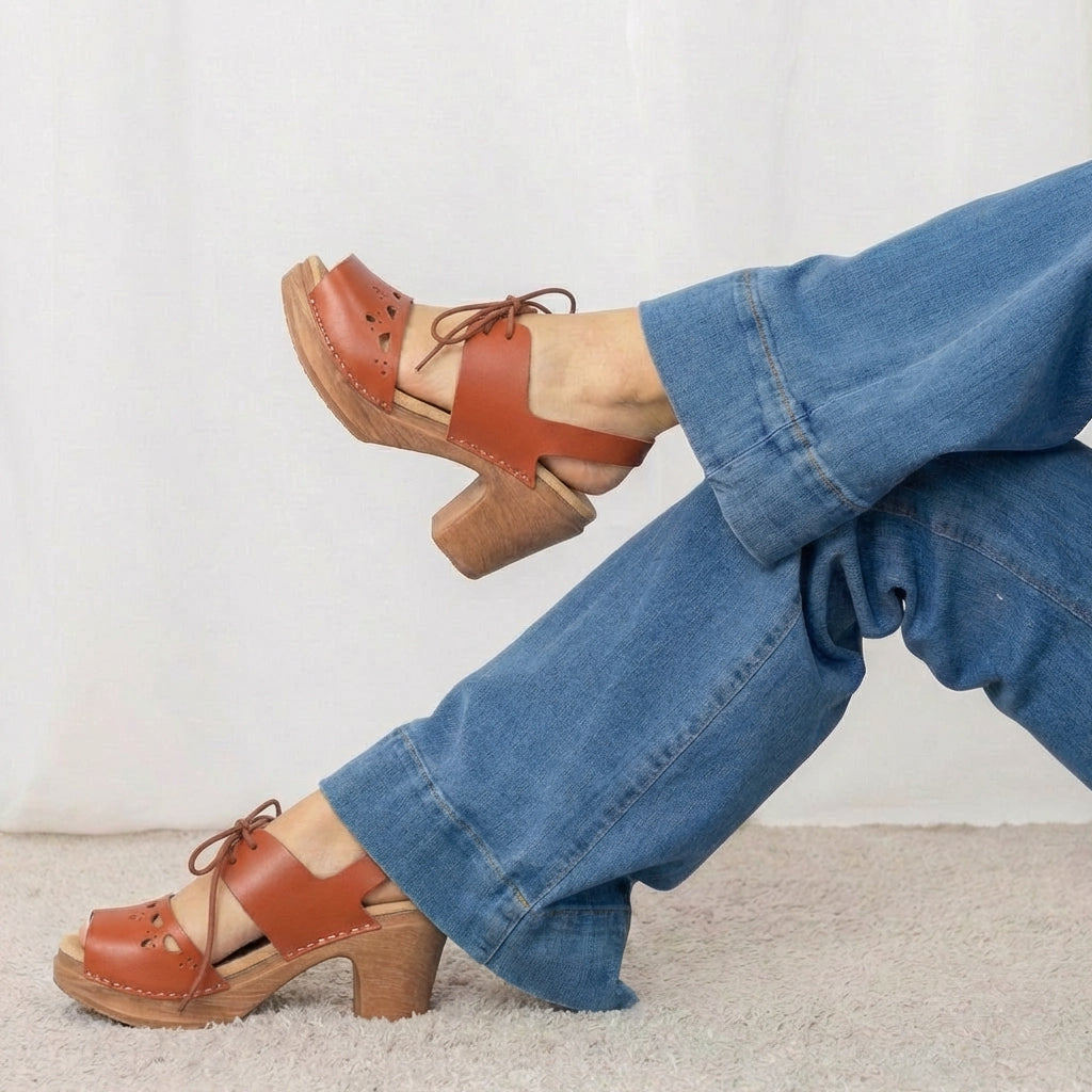 Calou Notty rust Mary Jane momens clogs with flexible sole worn with blue jeans 