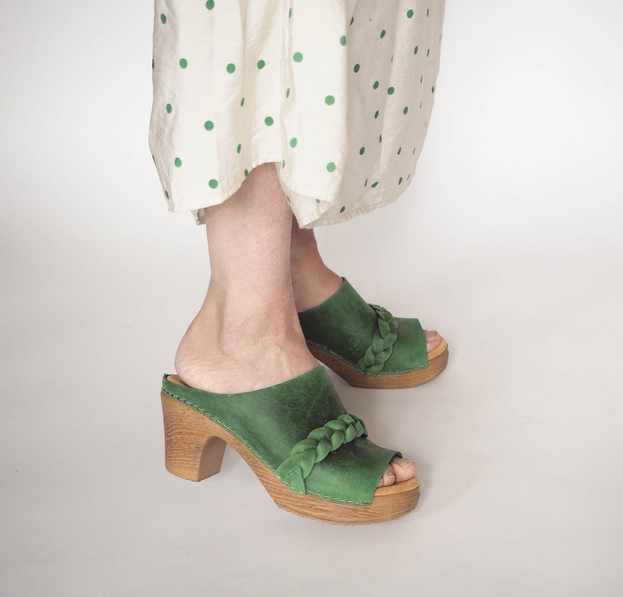 Nova green leather clog on model calou stockholm