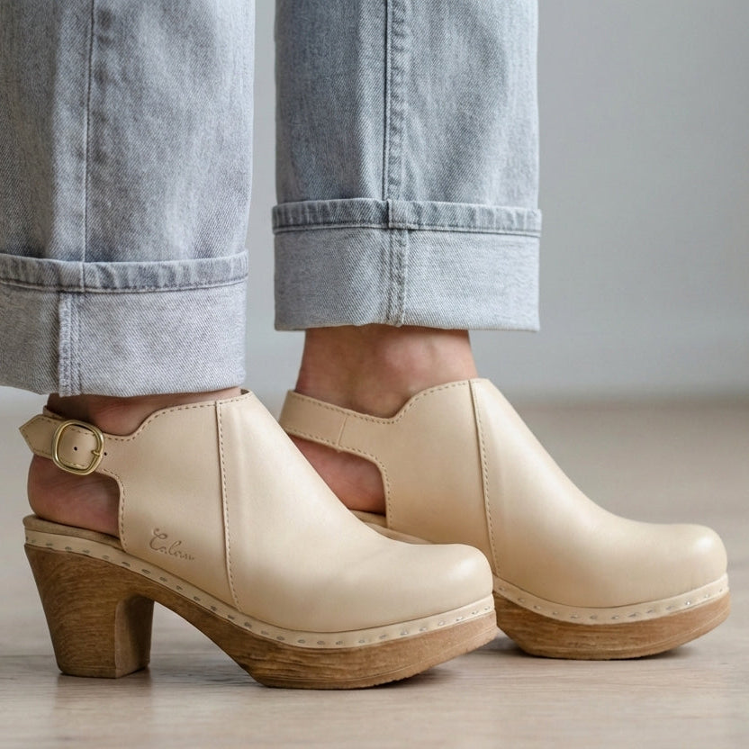 Beige clogs with wooden flexible soles for all day comfort