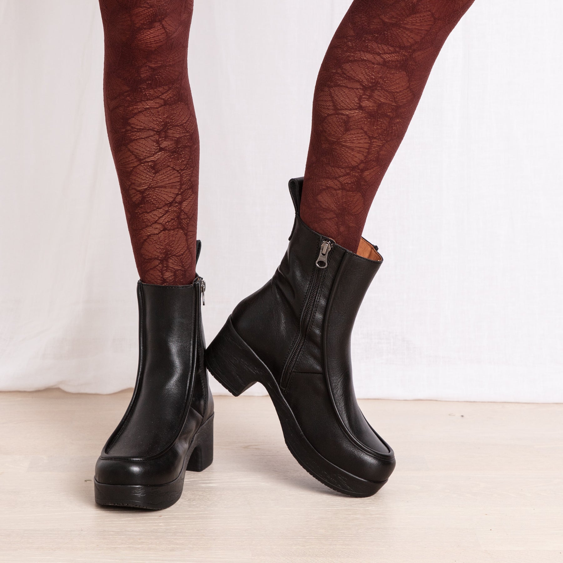 Viola black leather clog boots on model Calou