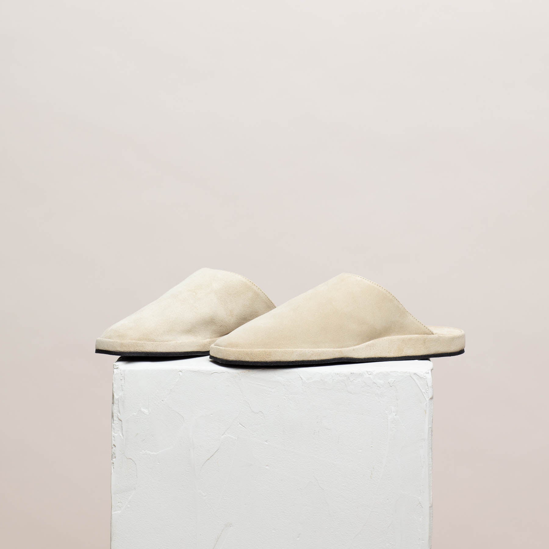 Tara off white suede slippers on pillar, Calou Stockholm